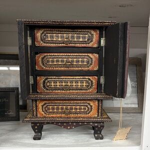 Intricately Designed Black and Gold Jewelry Box